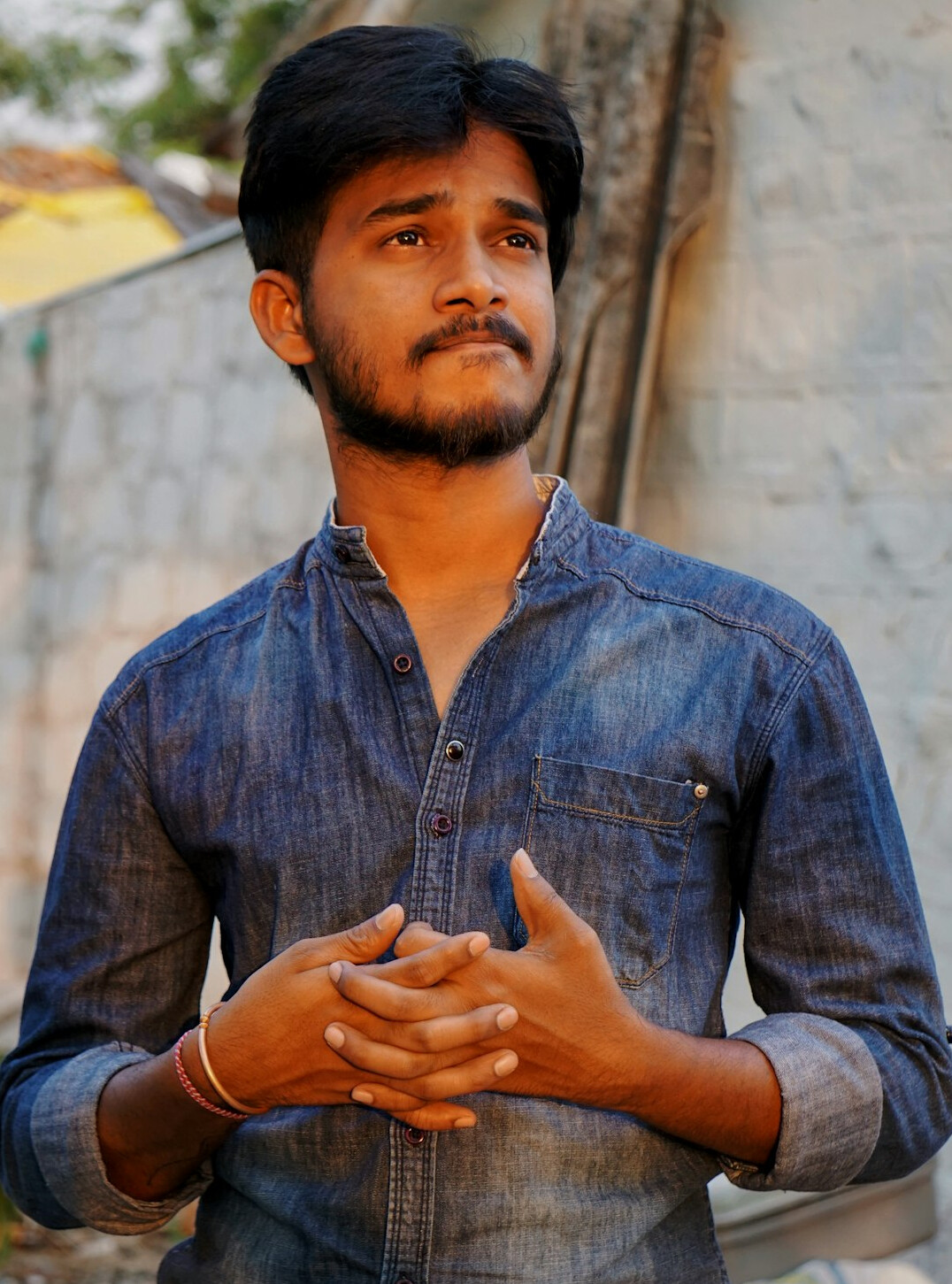Portrait of a smiling man in a casual shirt