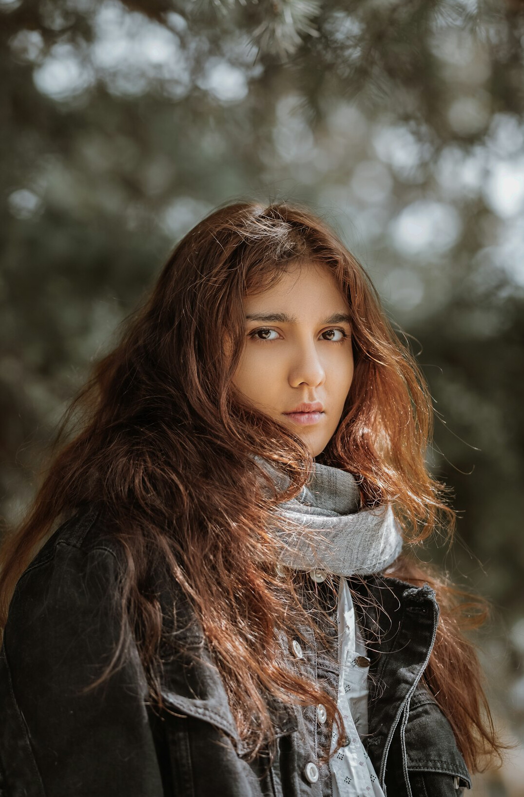 Portrait of a young woman with long hair