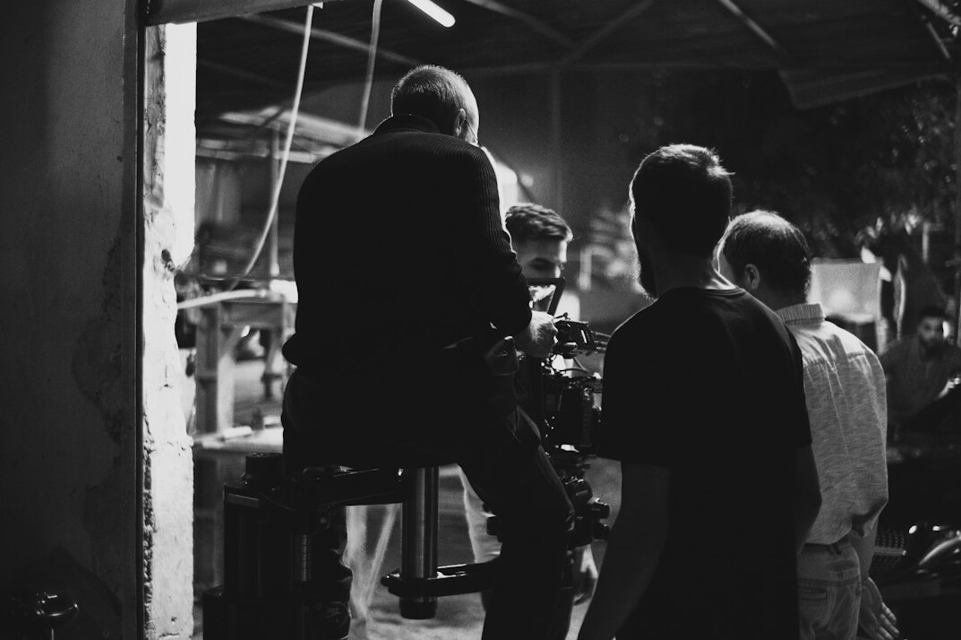 Editorial team meeting around a table